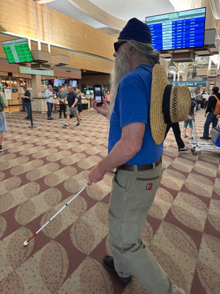 A blind user uses the GoodMaps app at EUG.