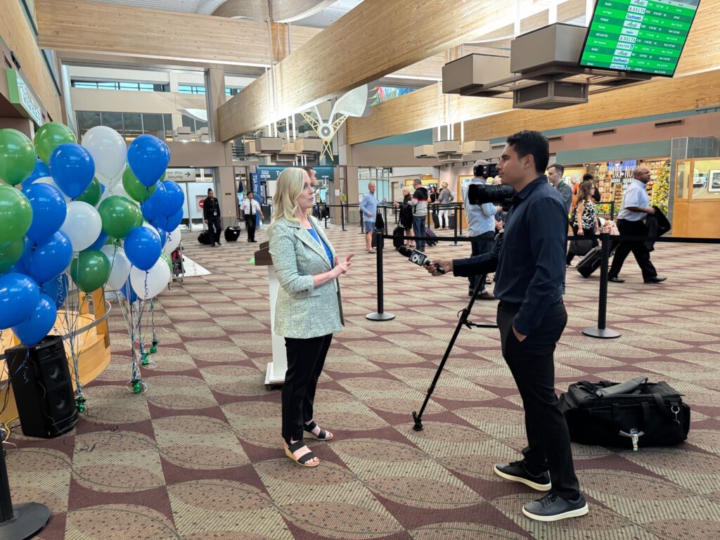A representative from EUG discusses the launch of GoodMaps at the airport during an interview.